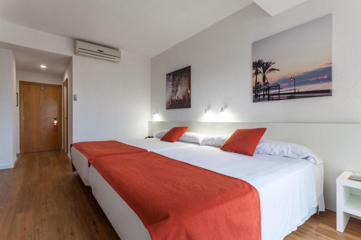 Cama o camas de una habitación en Intelier Orange