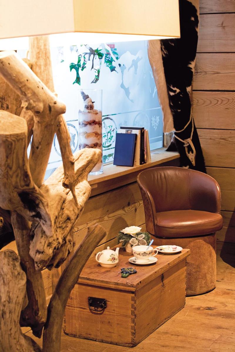 Télévision ou salle de divertissement dans l'établissement Les Gentianettes Hotel & Spa