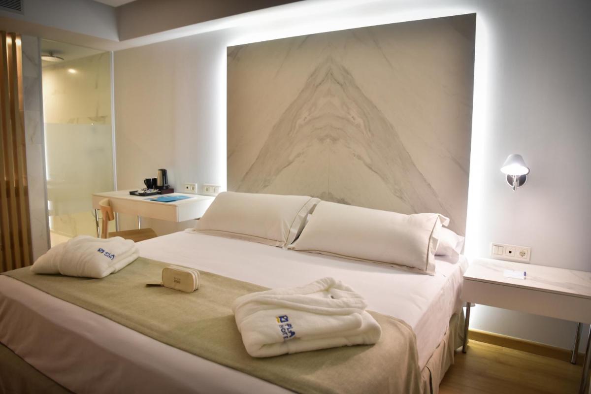 Cama o camas de una habitación en Talayot - Adults Only