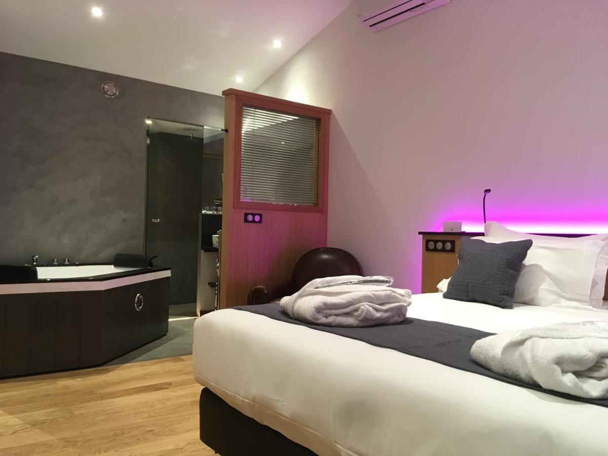 Un ou plusieurs lits dans un hébergement de l'établissement Hôtel Ile de Ré