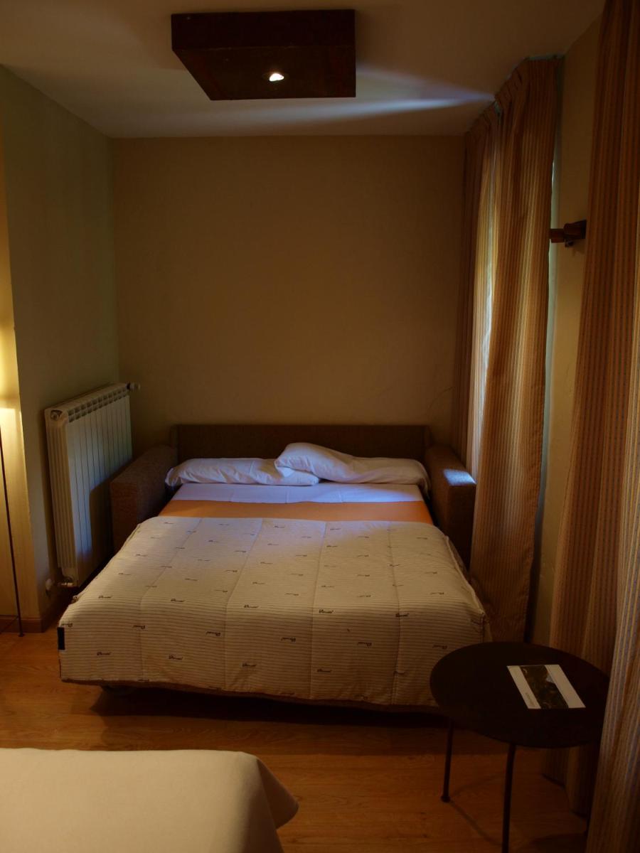 Cama o camas de una habitación en Hotel Santa Cristina Petit Spa
