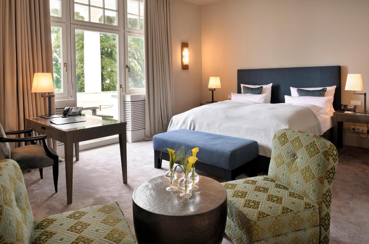 Ein Bett oder Betten in einem Zimmer der Unterkunft RIVA - Das Hotel am Bodensee