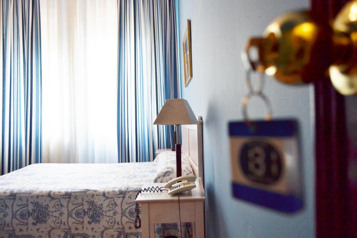 Cama o camas de una habitación en Gran Hotel Balneario de Liérganes