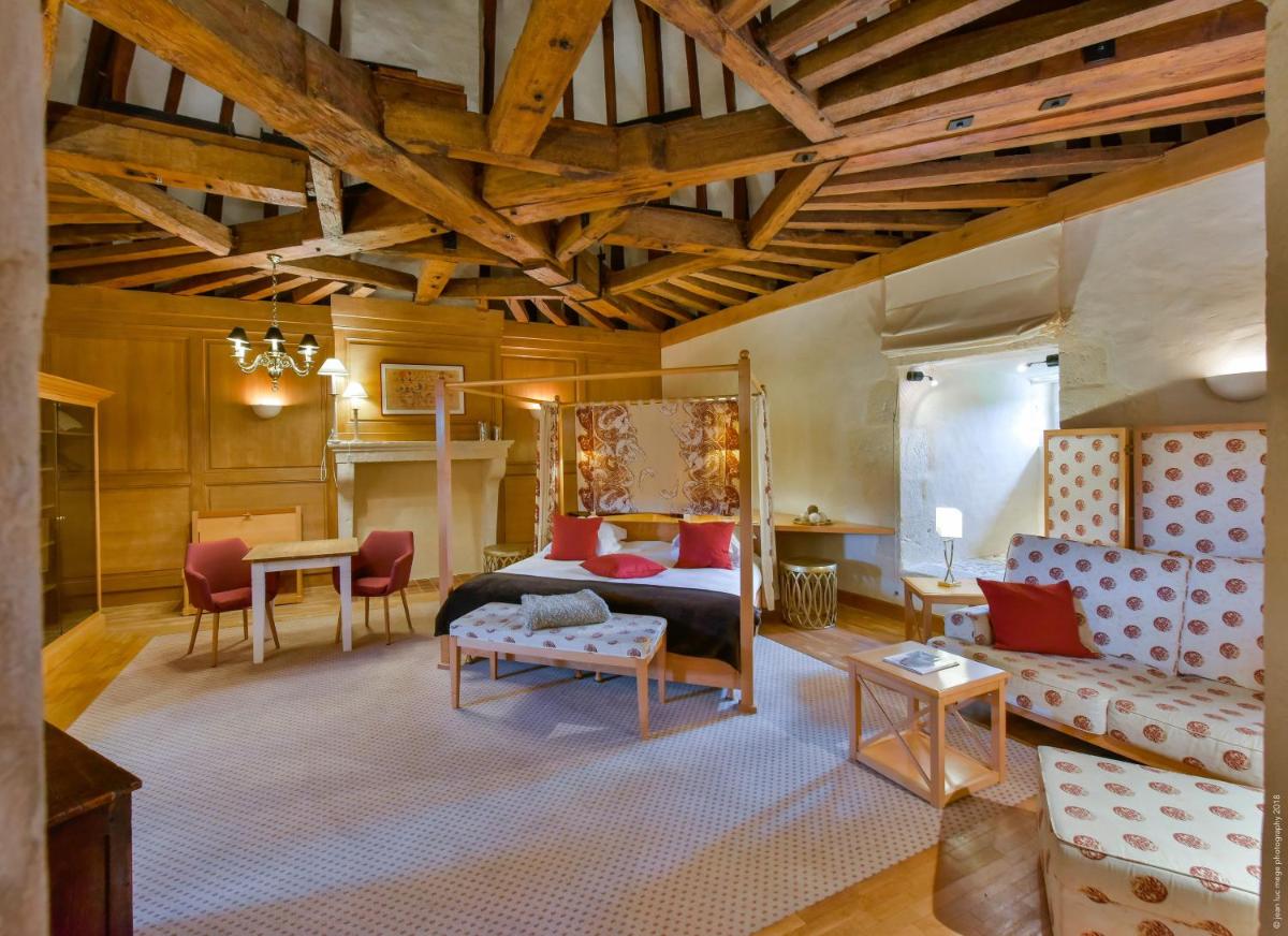 Coin salon dans l'établissement Hôtel Golf Château de Chailly