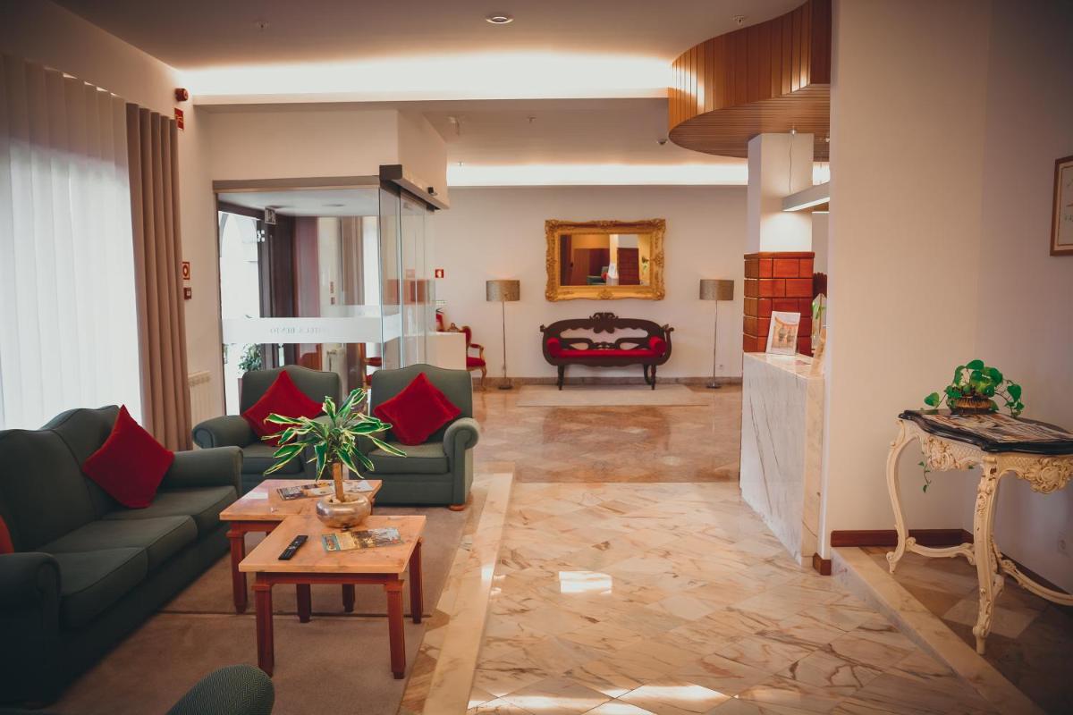Uma área de estar em Hotel São Bento da Porta Aberta & Spa