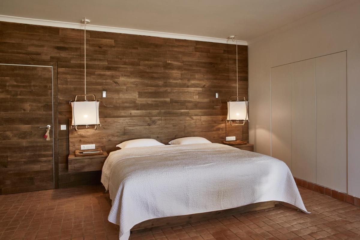 Uma cama ou camas num quarto em Vila Joya