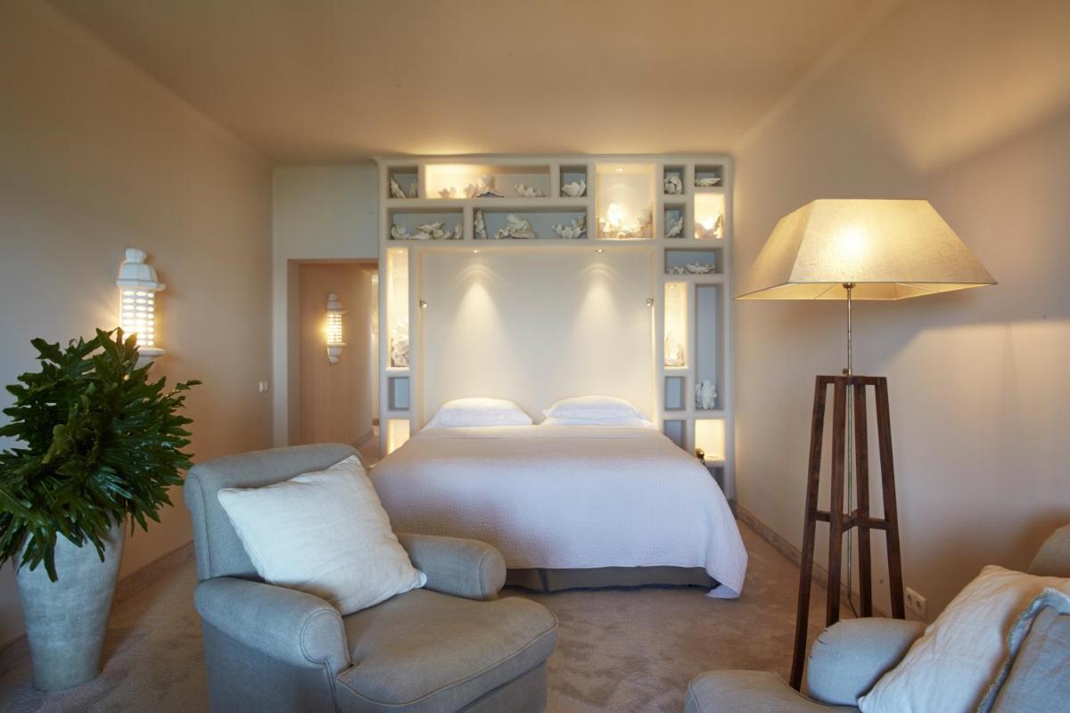 Uma cama ou camas num quarto em Vila Joya