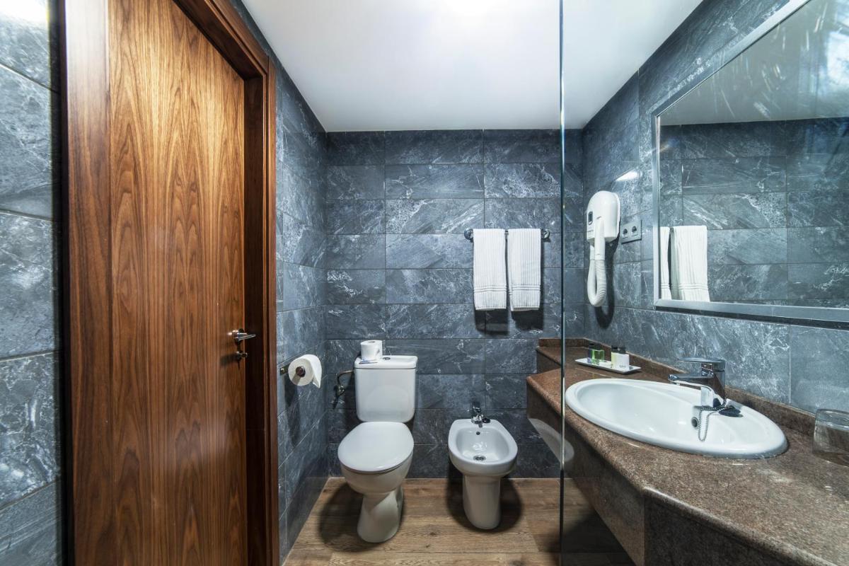 Un baño de Essence Hotel Boutique
