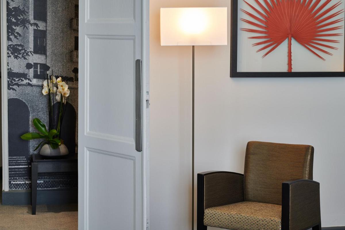 Coin salon dans l'établissement Hotel & Spa Vacances Bleues Le Splendid