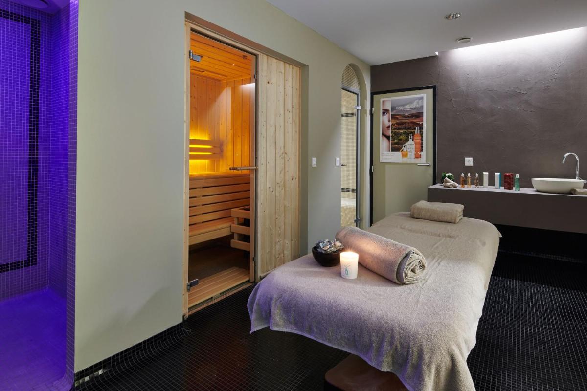 Un ou plusieurs lits dans un hébergement de l'établissement Hotel & Spa Vacances Bleues Le Splendid