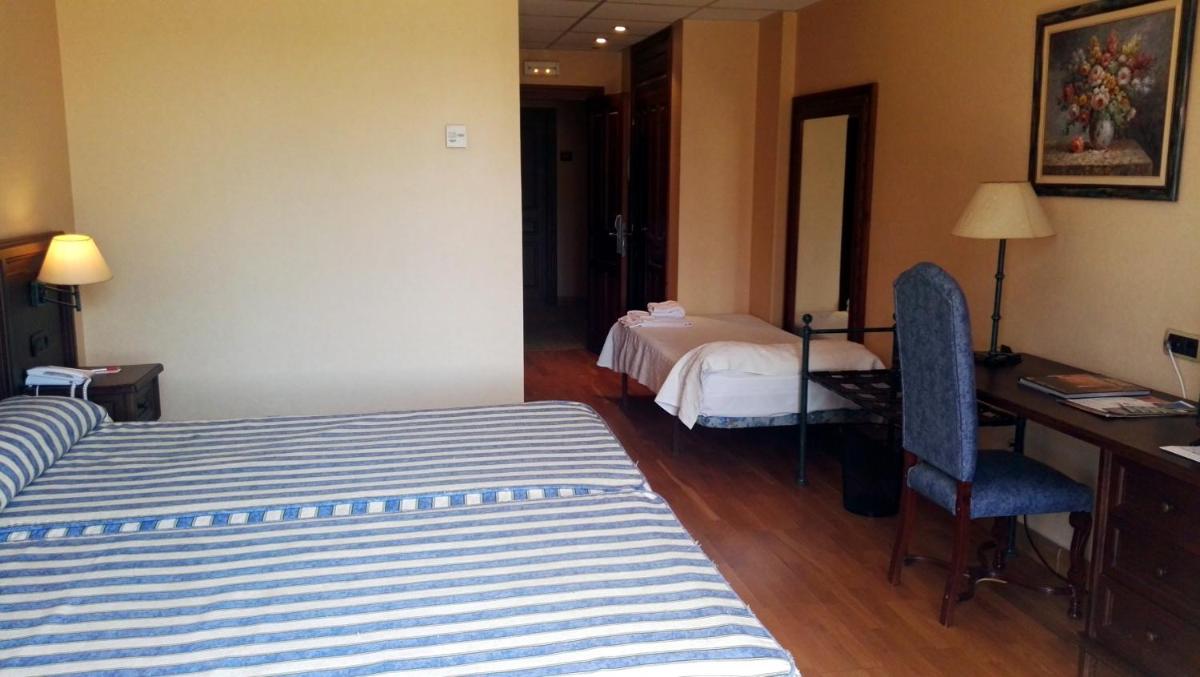 Cama o camas de una habitación en Hotel Spa Tudanca Aranda