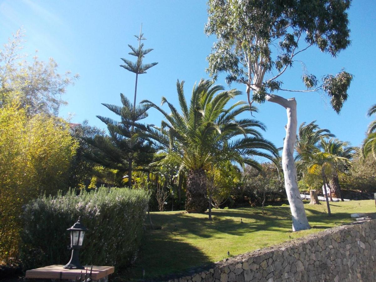 Jardín al aire libre en Hotel La Palma Romántica