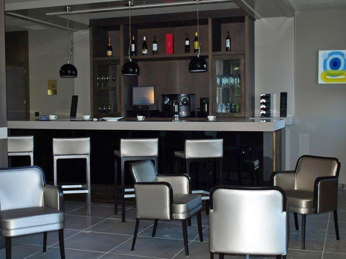 El salón o zona de bar de La Piconera Hotel & Spa