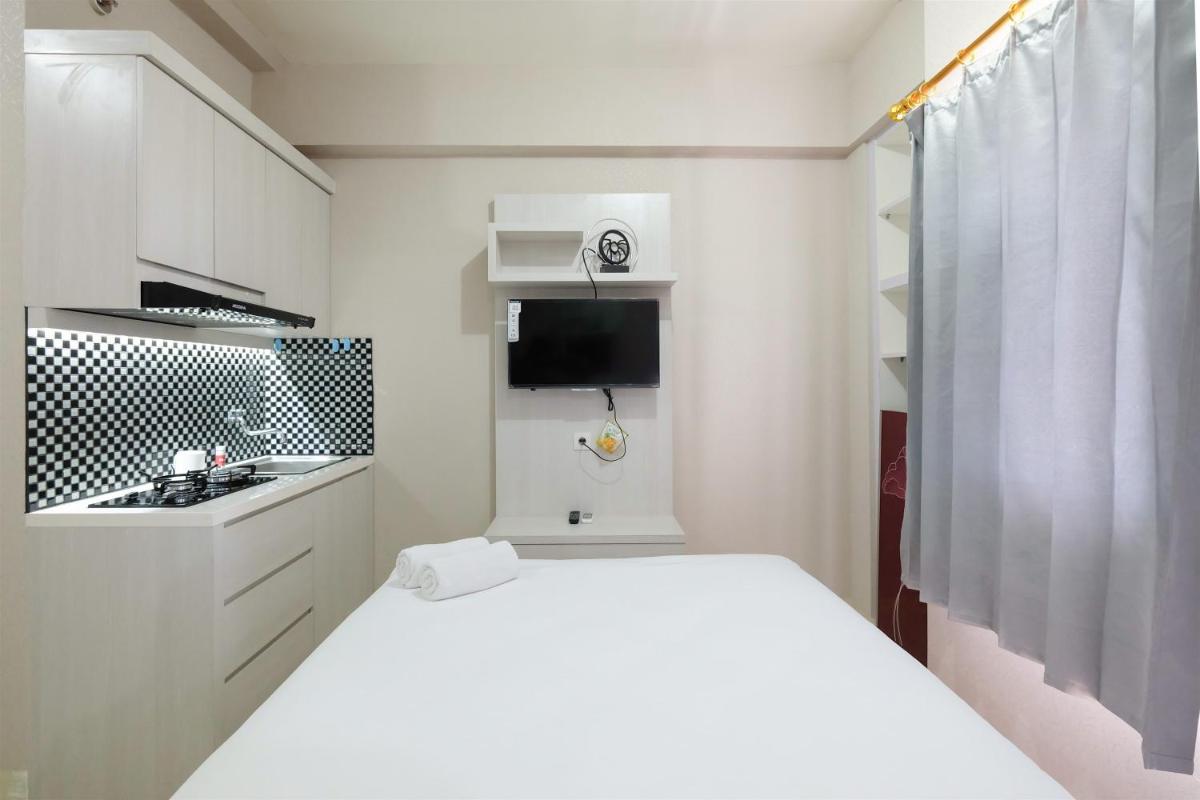 Studio Green Pramuka City a Serene Apartment Living By Travelio - Housity
