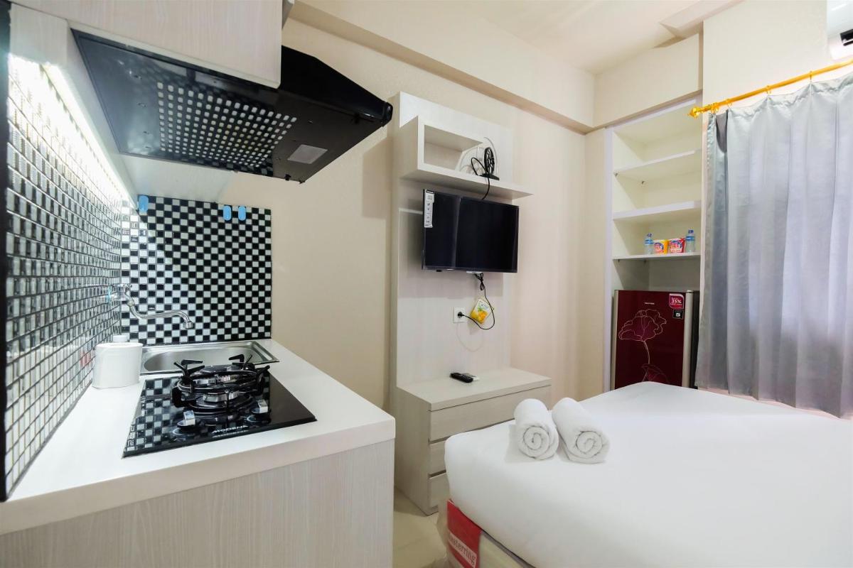 Studio Green Pramuka City a Serene Apartment Living By Travelio - Housity
