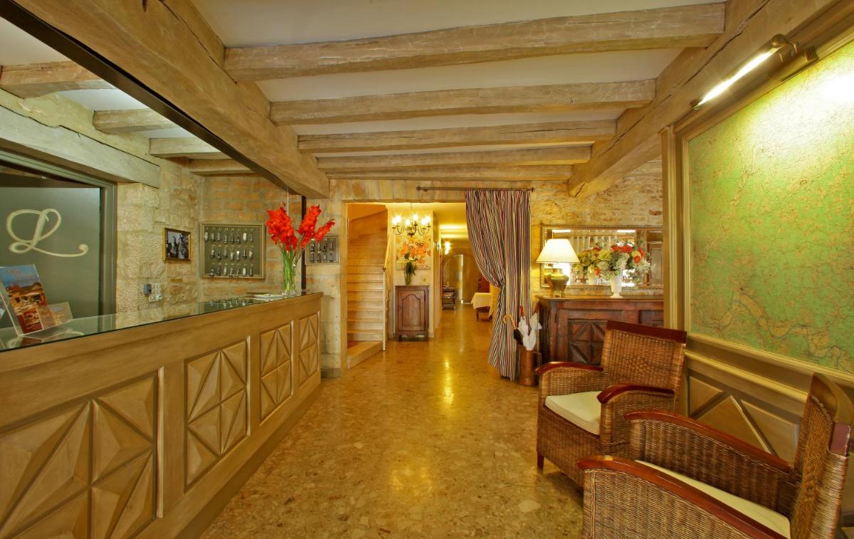 Coin salon dans l'établissement Hotel Restaurant Laborderie