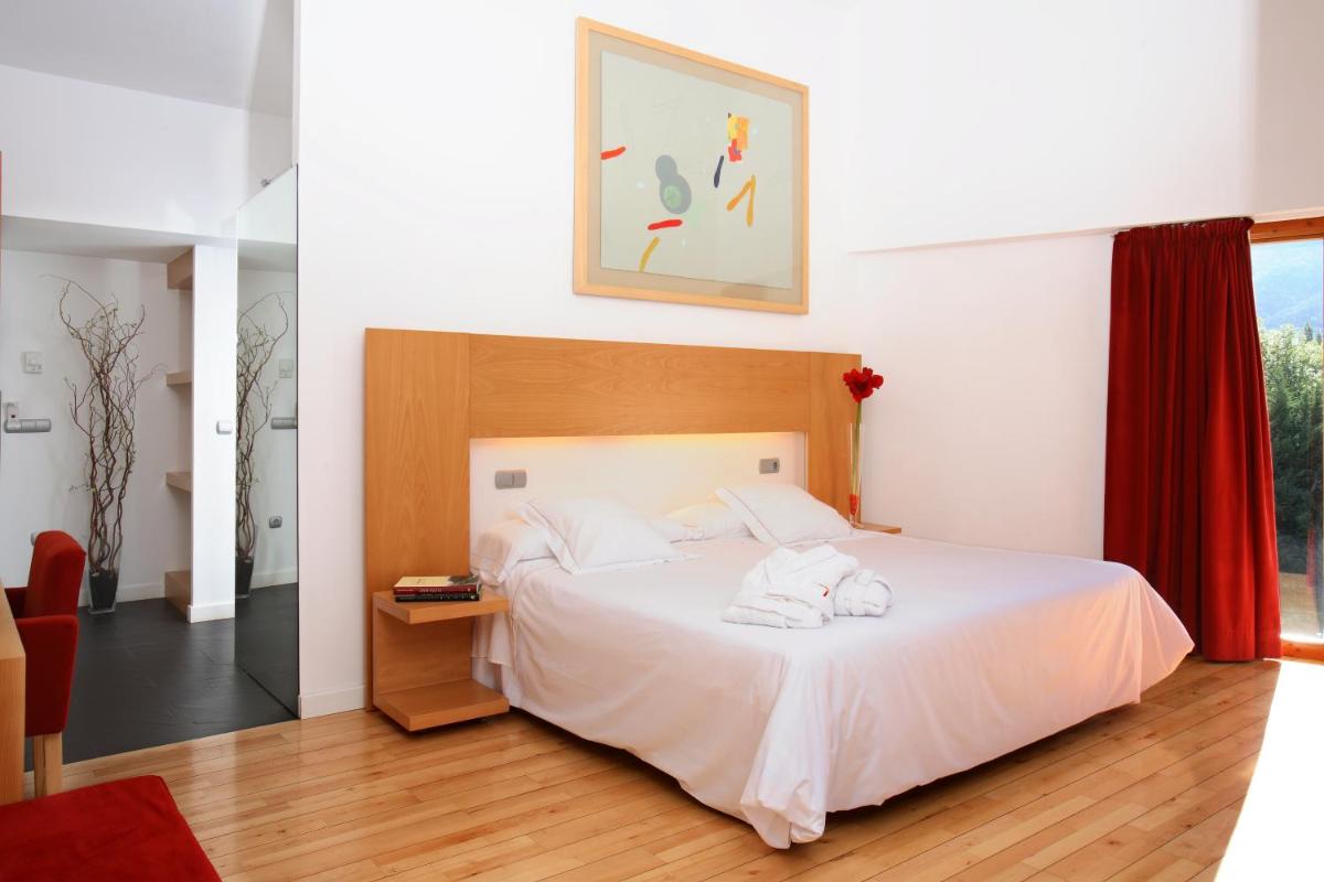Cama o camas de una habitación en Tierra de Biescas