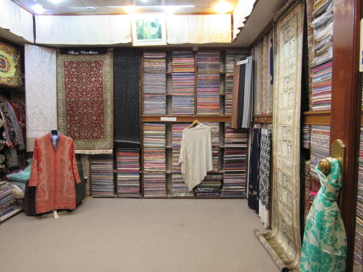 a room filled with lots of racks of dvds at Eros Hotel New Delhi, Nehru Place in New Delhi a room filled with lots of racks of dvds at Eros Hotel New Delhi, Nehru Place in New Delhi