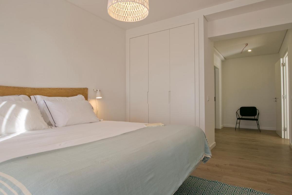 Uma cama ou camas num quarto em You and the sea