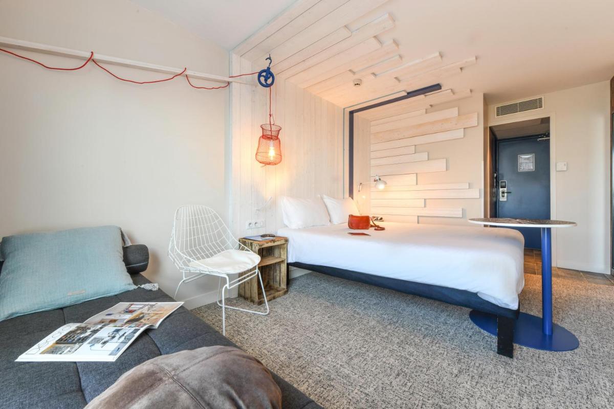 Un ou plusieurs lits dans un hébergement de l'établissement ibis styles La Rochelle Thalasso Chatelaillon