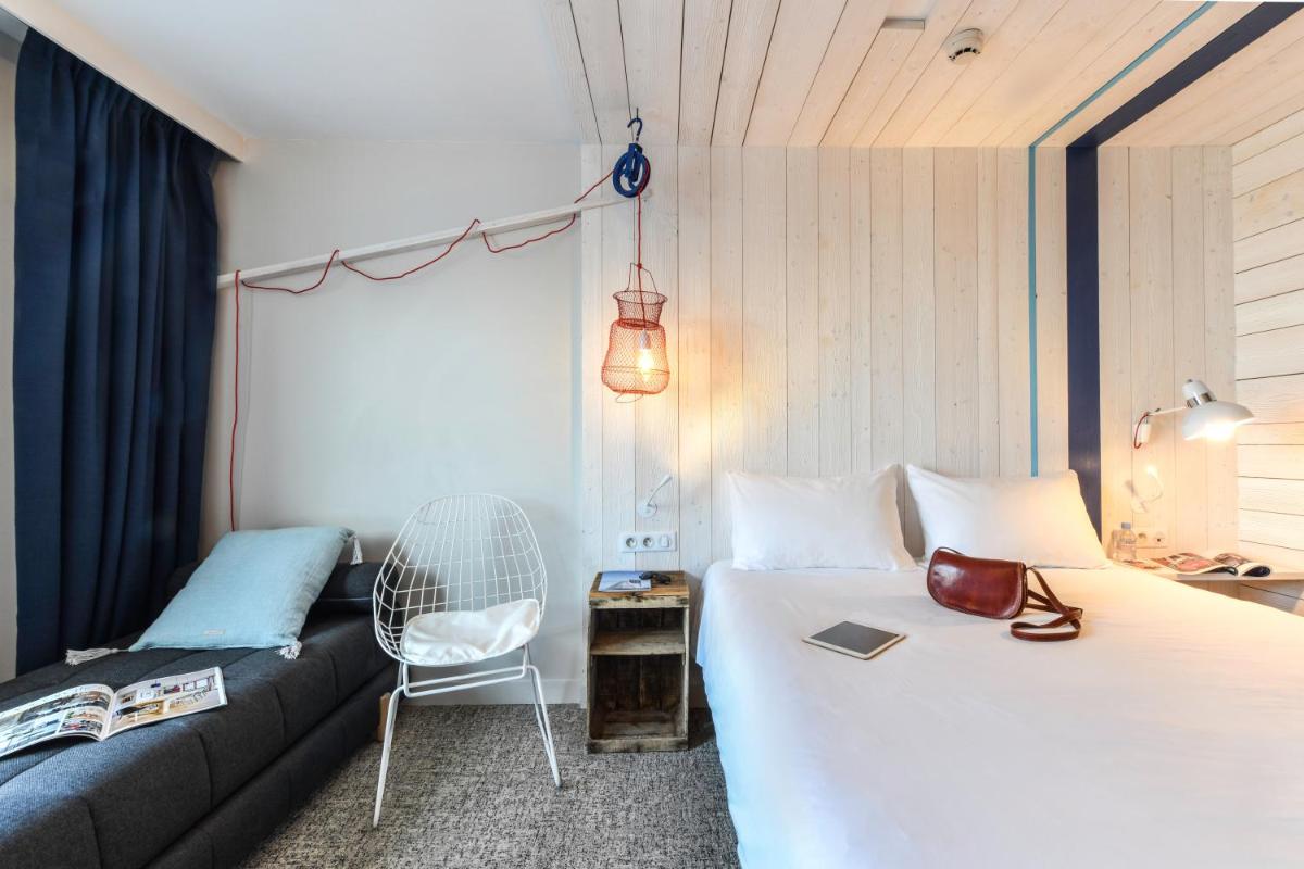 Un ou plusieurs lits dans un hébergement de l'établissement ibis styles La Rochelle Thalasso Chatelaillon