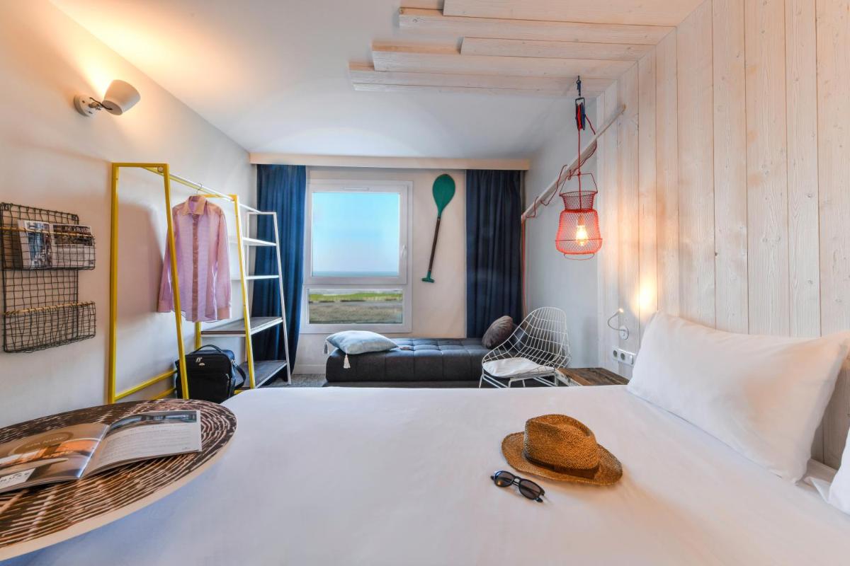Un ou plusieurs lits dans un hébergement de l'établissement ibis styles La Rochelle Thalasso Chatelaillon