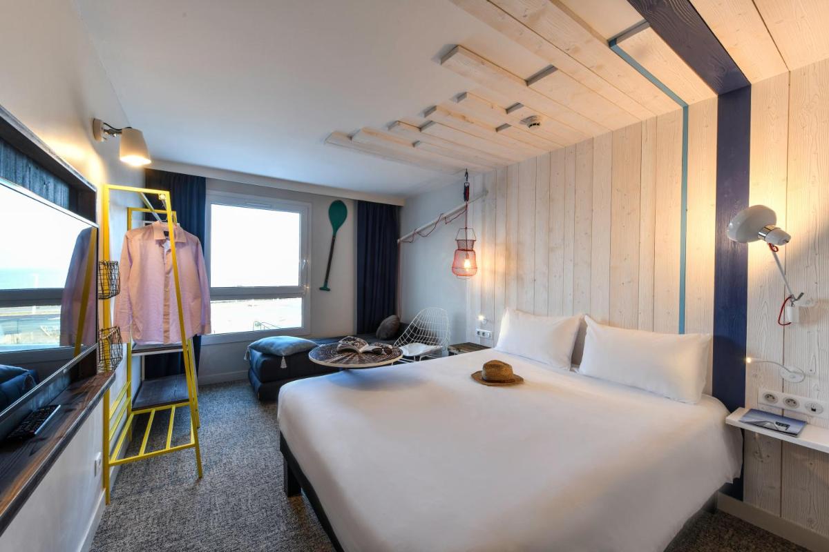 Un ou plusieurs lits dans un hébergement de l'établissement ibis styles La Rochelle Thalasso Chatelaillon