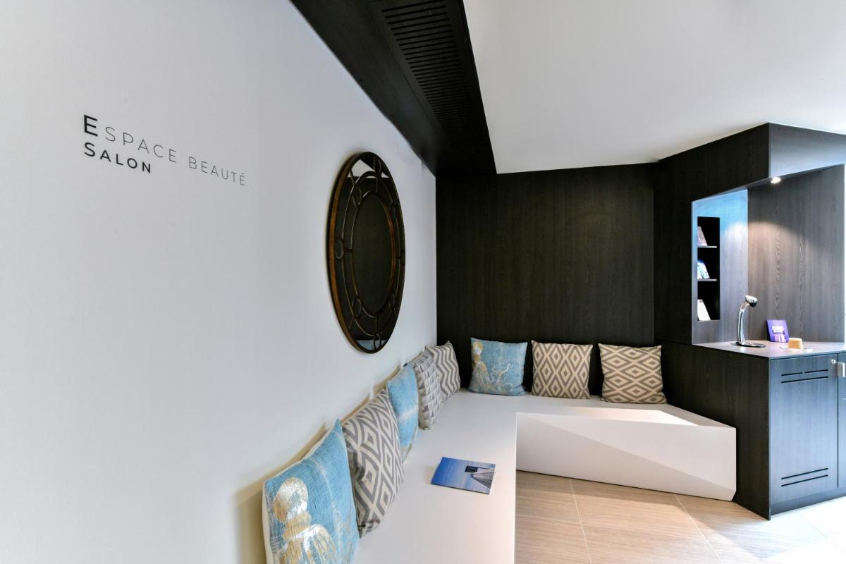Un ou plusieurs lits dans un hébergement de l'établissement ibis styles La Rochelle Thalasso Chatelaillon