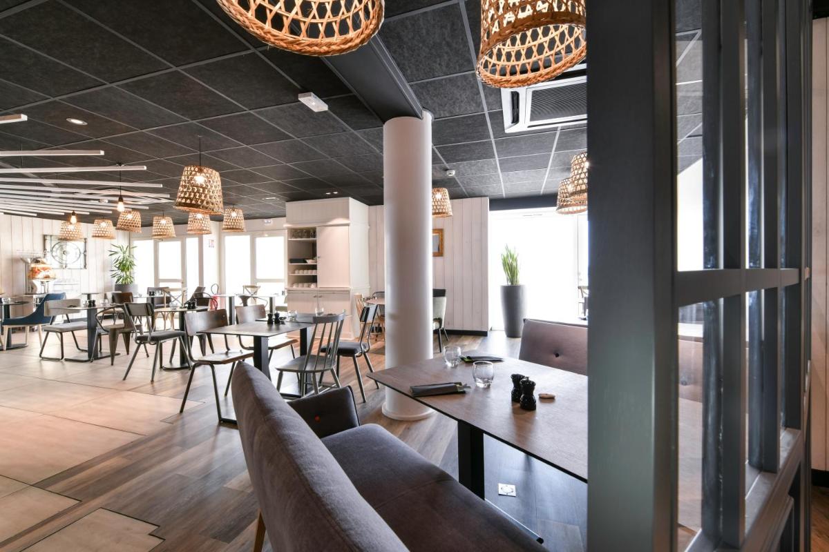 Restaurant ou autre lieu de restauration dans l'établissement ibis styles La Rochelle Thalasso Chatelaillon