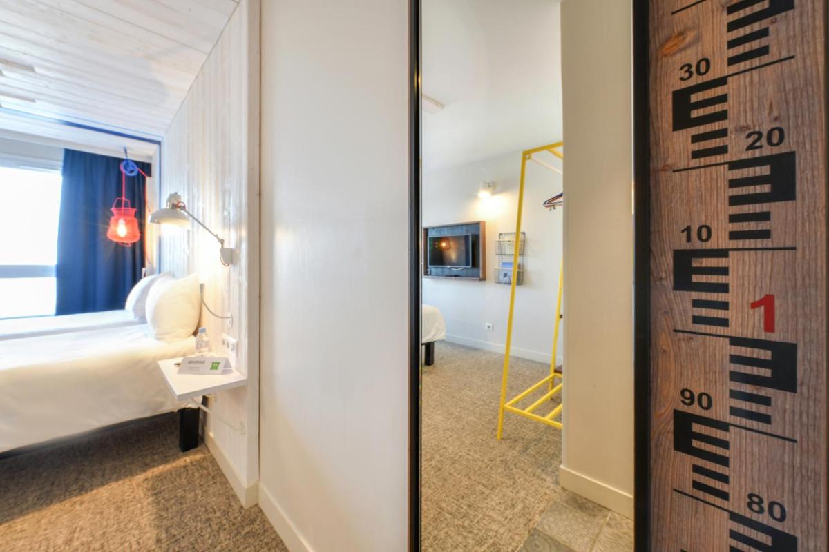 Un ou plusieurs lits dans un hébergement de l'établissement ibis styles La Rochelle Thalasso Chatelaillon