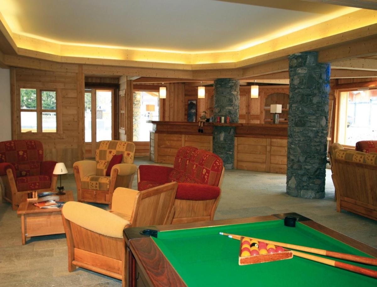 Coin salon dans l'établissement Lagrange Vacances Le Hameau du Rocher Blanc