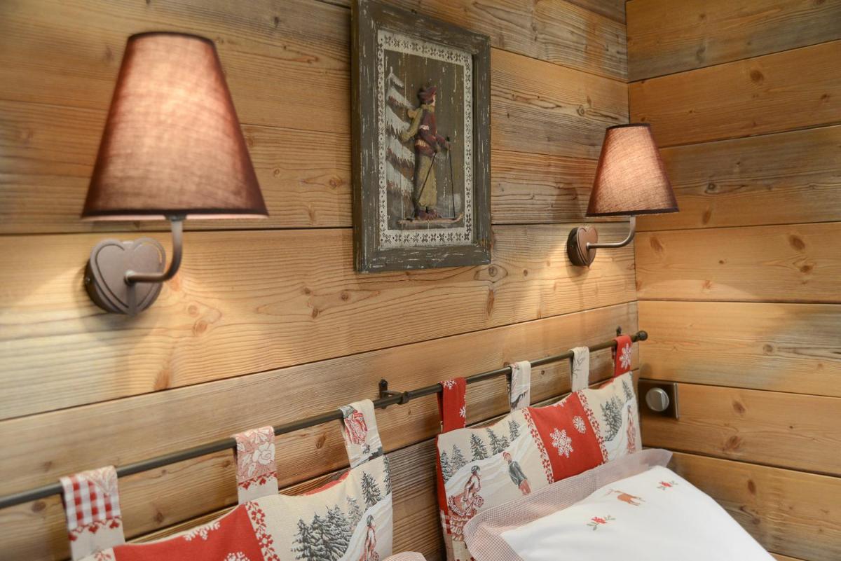 Un ou plusieurs lits dans un hébergement de l'établissement Café-Hôtel Le Morillon, Domaine du Grand Massif-Samoëns