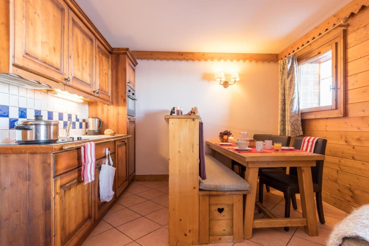 Cuisine ou kitchenette dans l'établissement Résidence Pierre & Vacances Premium Les Hauts Bois