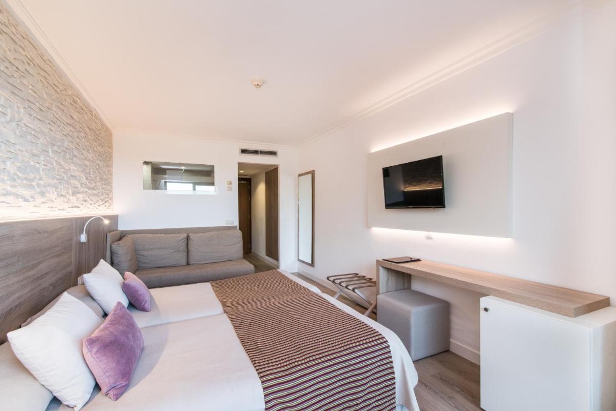 Cama o camas de una habitación en Hotel Na Taconera
