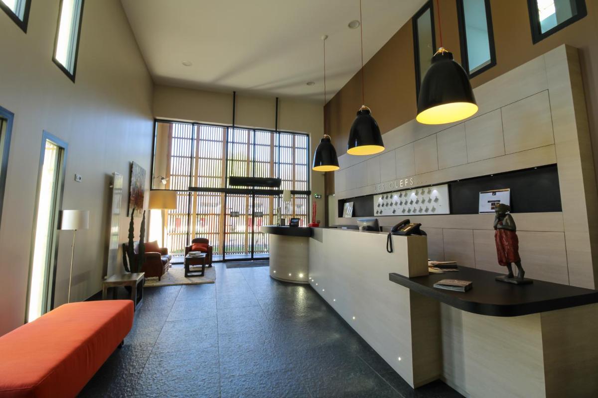 Cuisine ou kitchenette dans l'établissement Loire & Sens