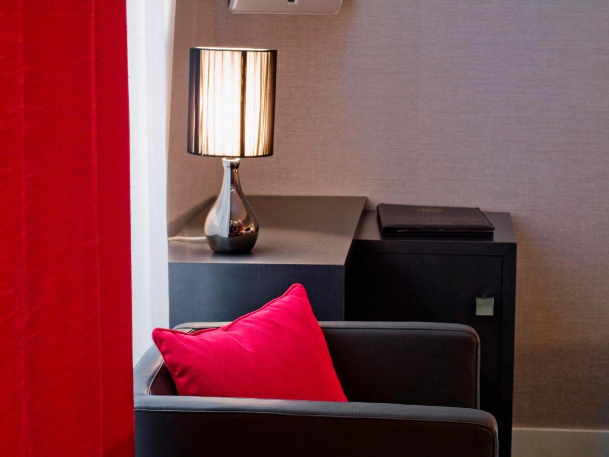 Coin salon dans l'établissement Chapeau Rouge par William Frachot - Hôtel Espace Bien-être & Restaurant étoilé