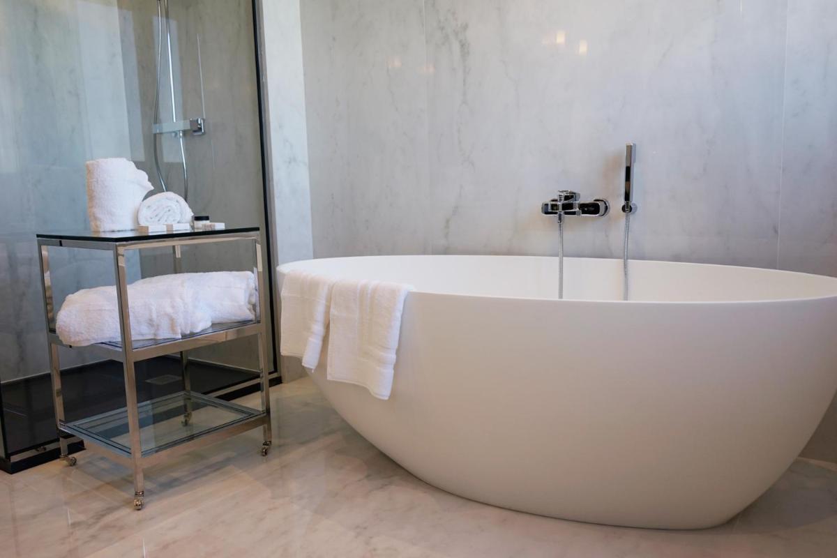 Salle de bains dans l'établissement Hôtel Restaurant le Touring - Teritoria