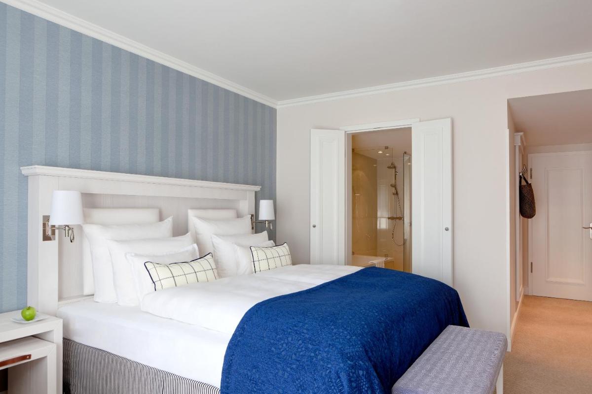 Ein Bett oder Betten in einem Zimmer der Unterkunft Steigenberger Grandhotel & Spa Heringsdorf