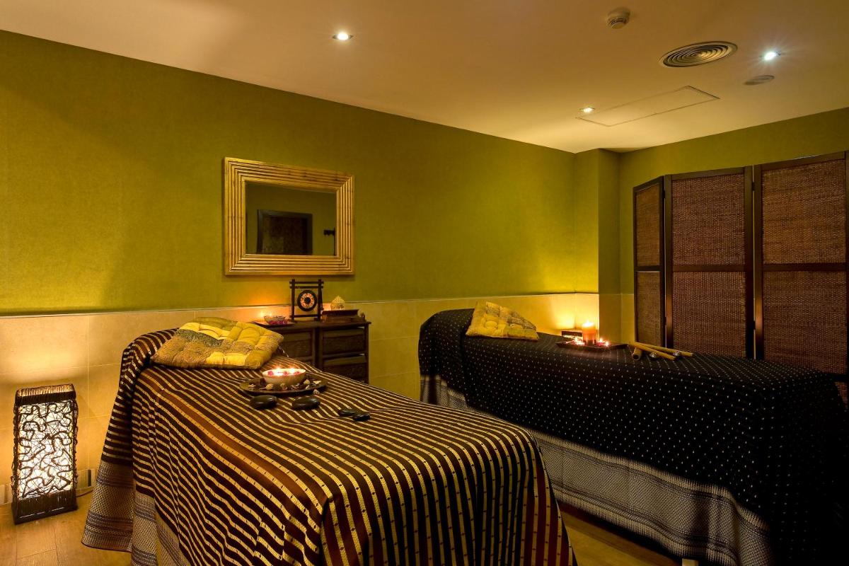 Cama o camas de una habitación en Barceló Punta Umbría Beach Resort