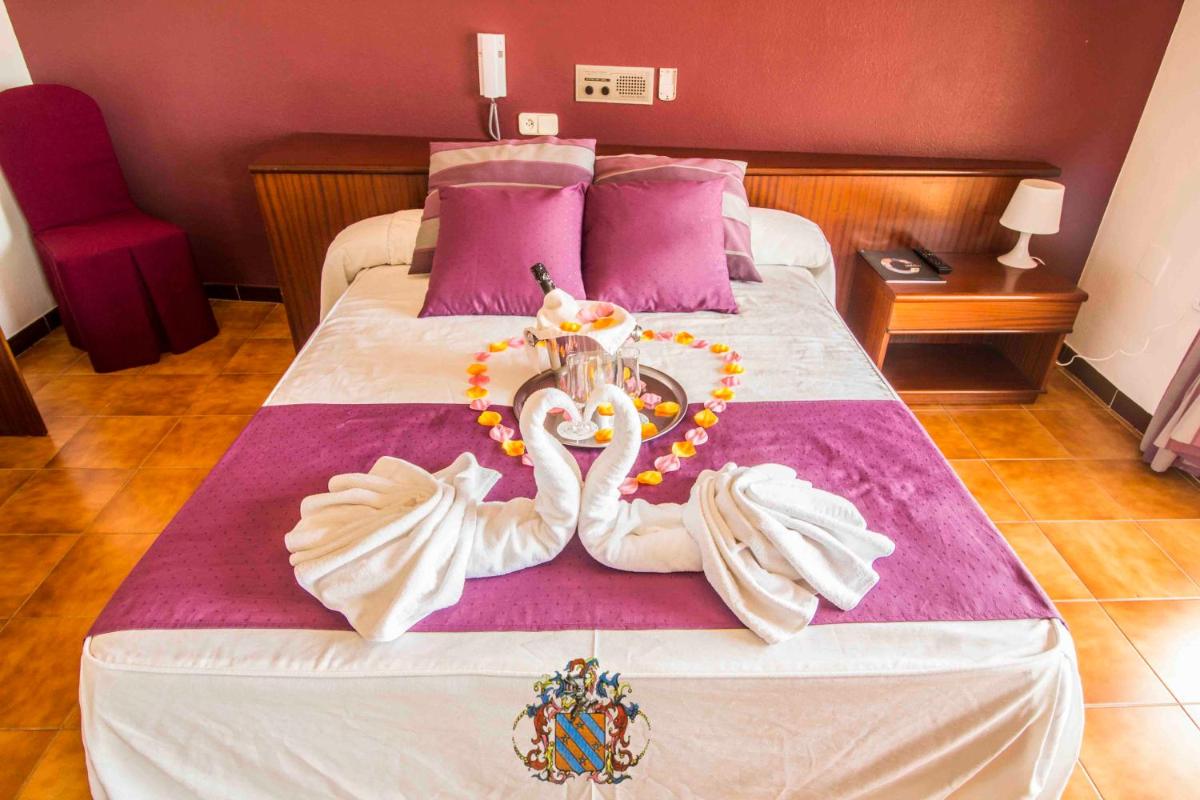 Cama o camas de una habitación en Hotel Victoria Spa & Splay Center