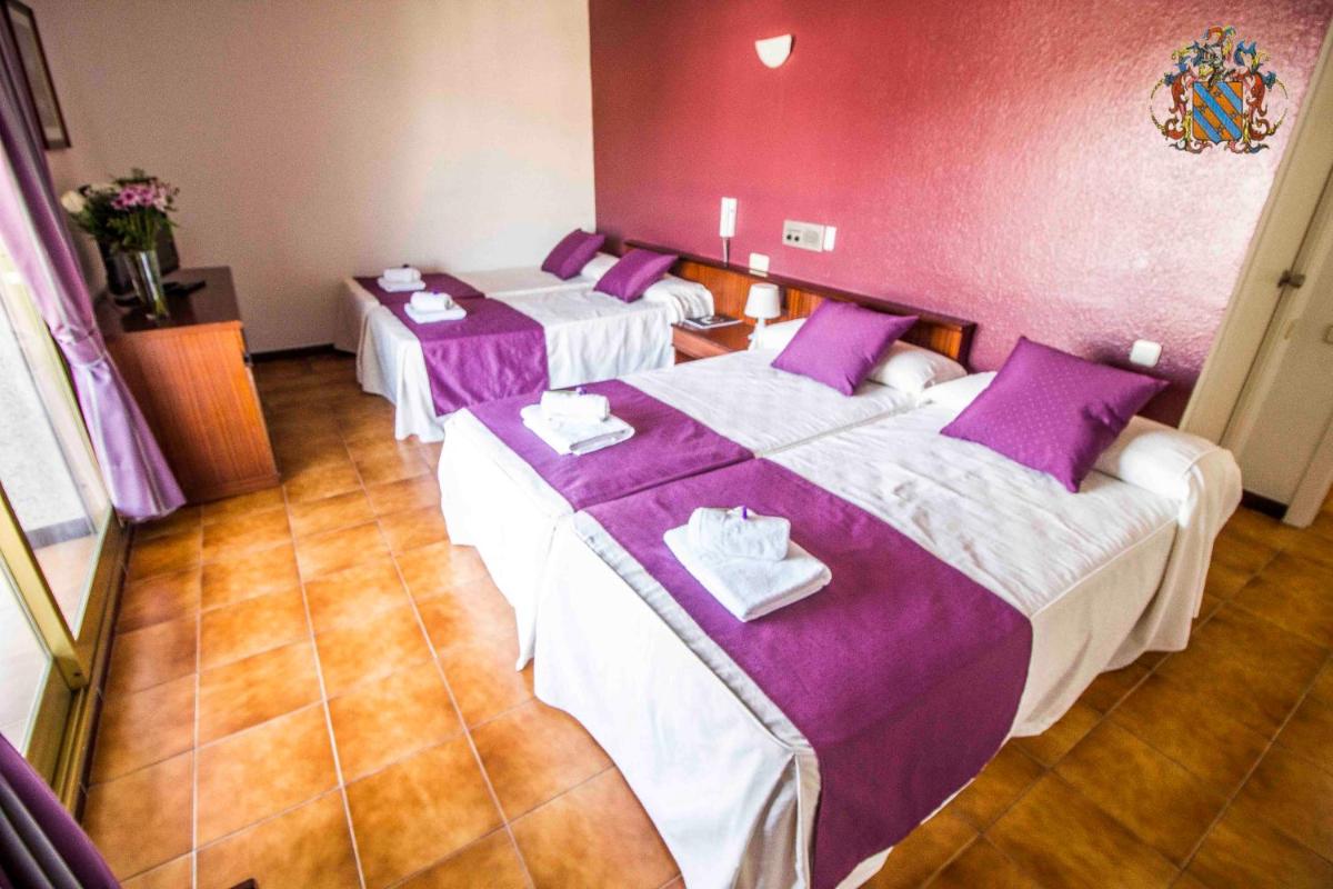 Cama o camas de una habitación en Hotel Victoria Spa & Splay Center