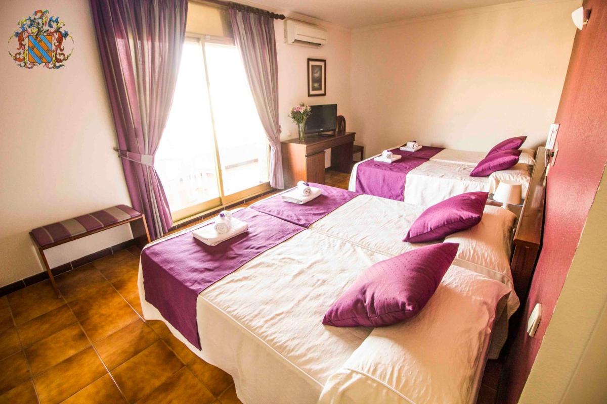 Cama o camas de una habitación en Hotel Victoria Spa & Splay Center