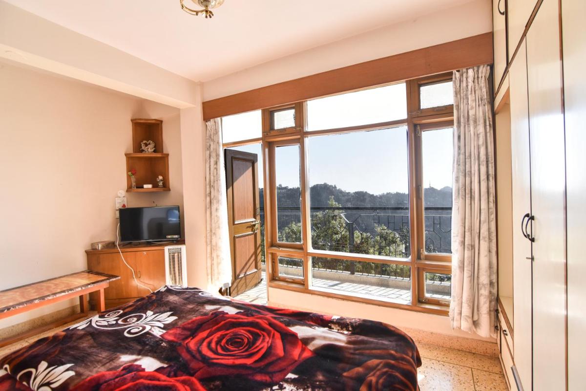 Suitetrails - Dhanlaxmi Apartments