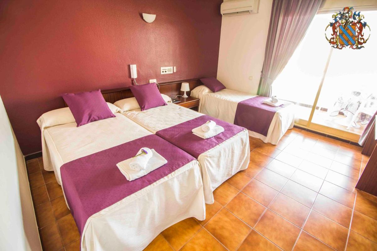 Cama o camas de una habitación en Hotel Victoria Spa & Splay Center