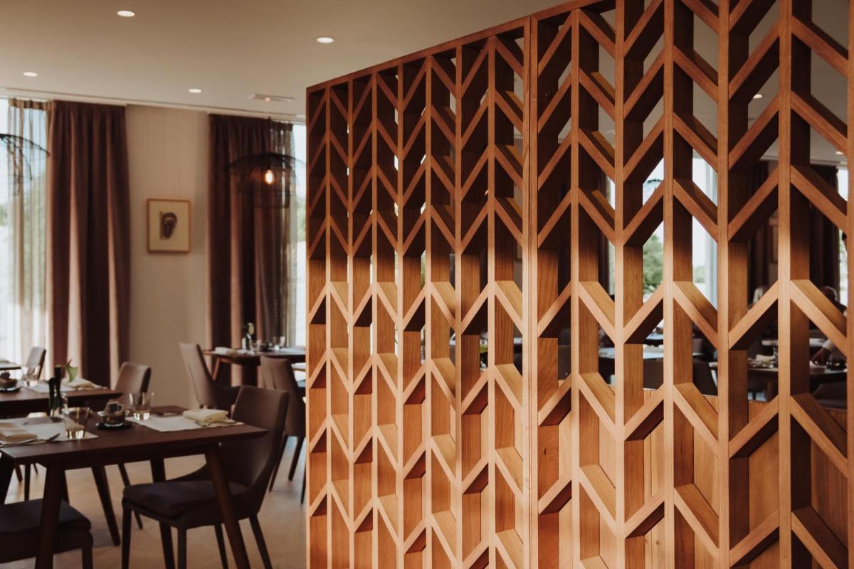 Un restaurante o sitio para comer en Es Princep - The Leading Hotels of the World
