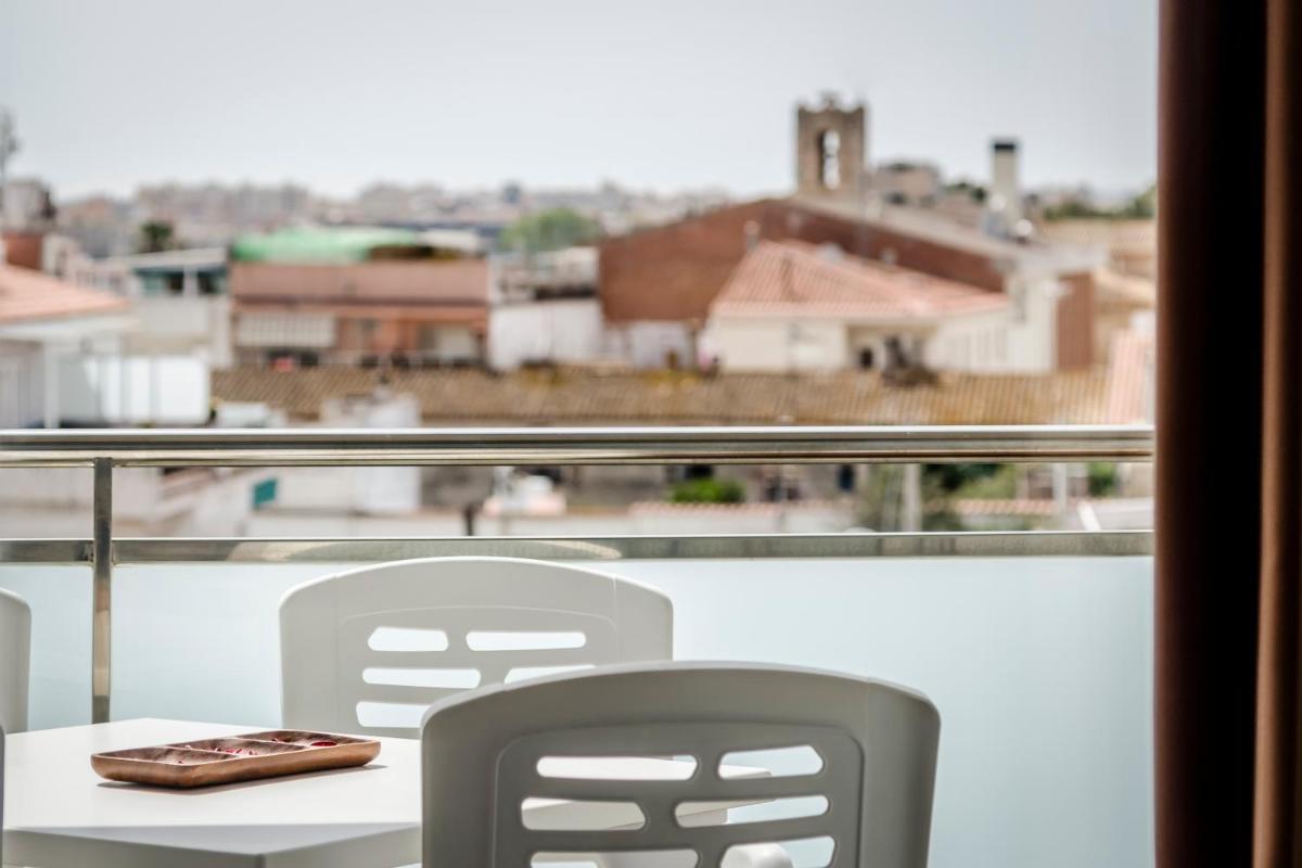 Un balcón o terraza de Exe Cunit Suites & Spa