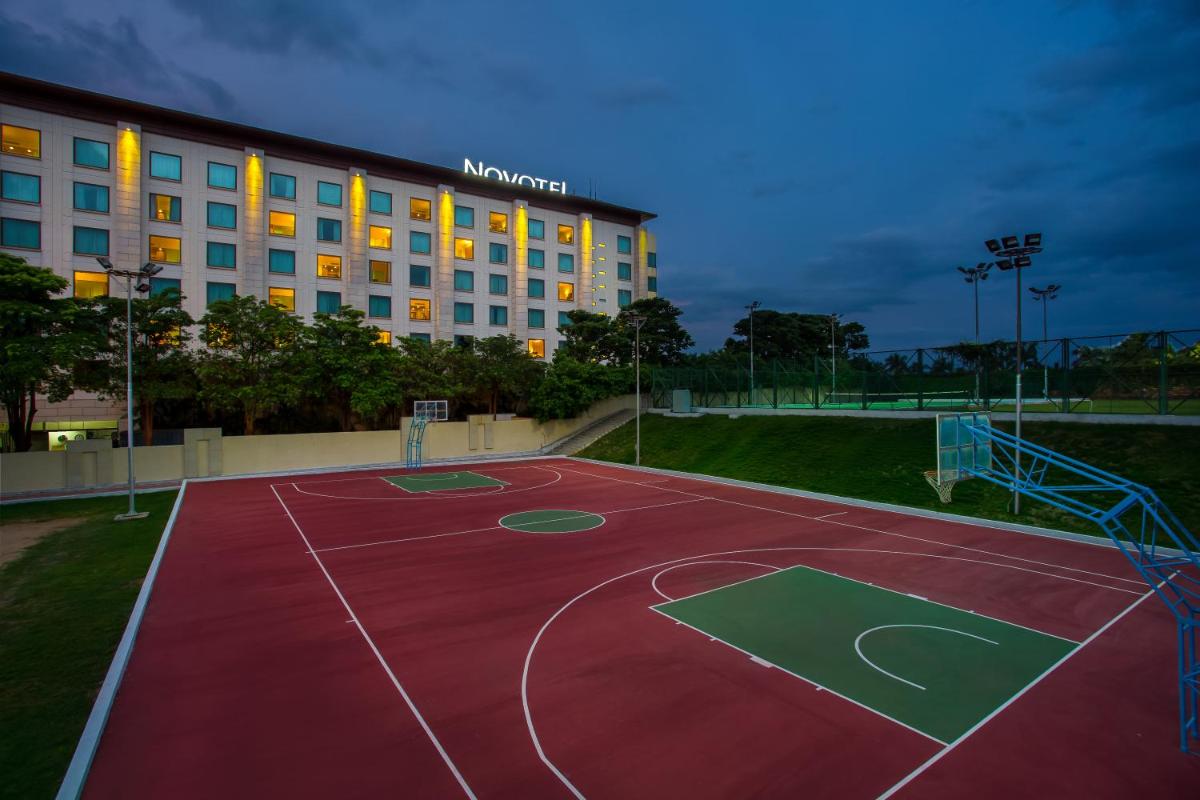 a basketball court in front of a hotel at Novotel Hyderabad Airport in Hyderabad