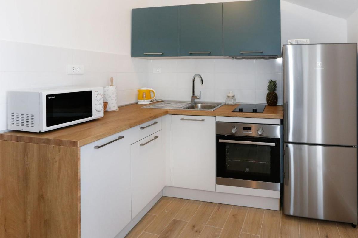 Apartments and Rooms Stone House - Housity