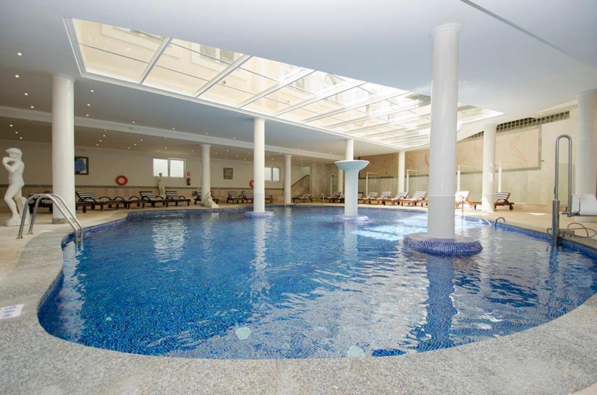 Piscina en o cerca de Grand Hotel Palladium Santa Eulalia del Río