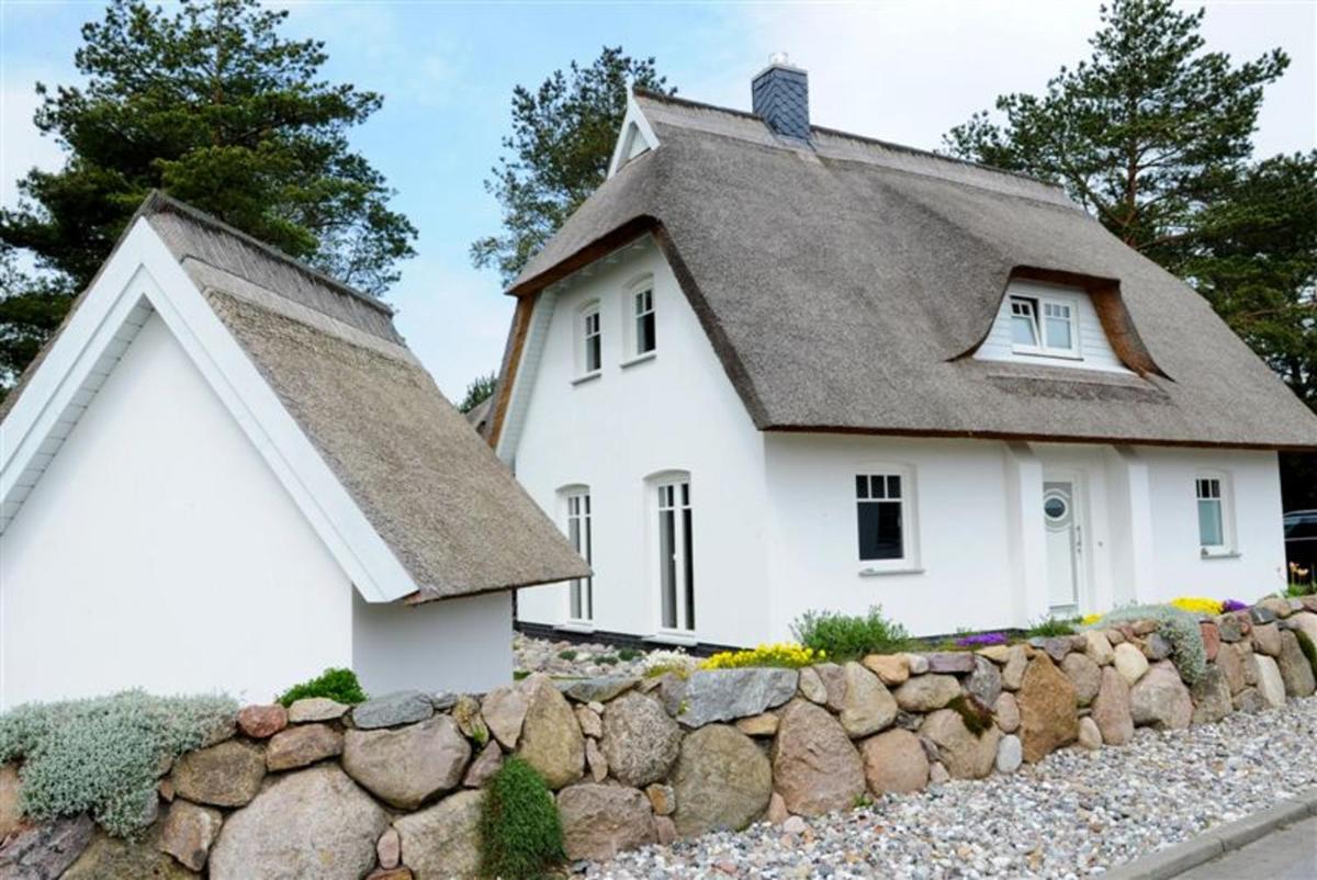 Idylle unterm Reet - Reetdachhäuser am Walde - Housity